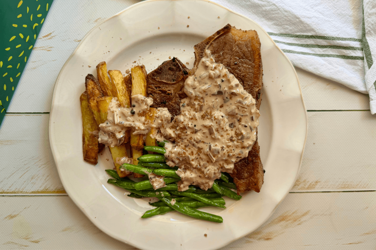 T Bone Steak with Chips, Green Beans and Peppercorn Sauce